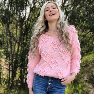 Pink pompom sweater